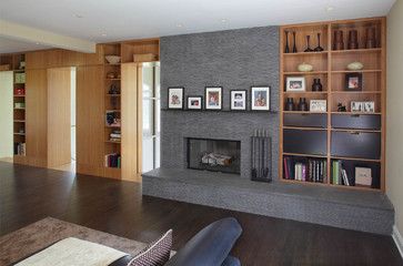 Extend hearth to wall? love the mantel too. Ardsley Residence - modern - family room - new york - Eisner Design LLC Asymmetrical Fireplaces, Off Center Fireplace, Mid Century Modern Fireplace, Modern Fireplace Mantels, Contemporary Family Room, Modern Family Rooms, Fireplace Built Ins, Fireplace Remodel, Trendy Living Rooms