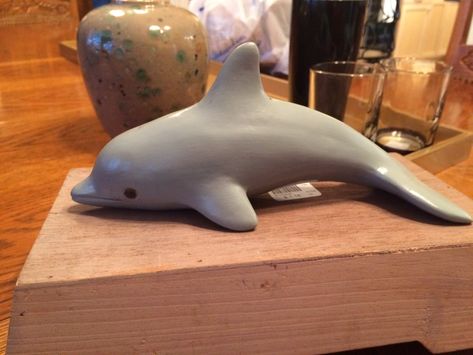 Ceramic dolphin $1.18 Clay Dolphin Tutorial, Dolphin Pottery, Polymer Clay Dolphin, Dolphin Clay Sculpture, Ceramic Ocean Animals, Dolphin Ceramics, Ceramic Dolphin, Clay Dolphin, Clay Plant Pots