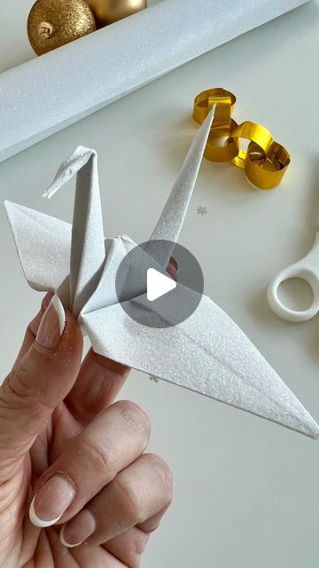 JAM Paper & Envelope on Instagram: "Welcoming 2024 with the timeless symbol of new beginnings – the Origami Crane! 🕊️✨ 

Dive into our tutorial and learn how to fold your own crane, representing fresh starts and endless possibilities.🦢

In some cultures, cranes symbolize new beginnings and a fresh start. This association comes from the crane’s behavior of migrating to new locations and its graceful takeoff and landing.

What’s your New Year’s resolution or what new adventure are you embarking on in 2024? Share it in the comments below and let’s inspire each other for a year full of growth and transformation! 💪💫

 #NewBeginnings #OrigamiMagic #2024Goals #FreshStart #NewYearNewYou #DIYCrafts #Inspiration #PaperArt #PaperCrafting #CreativeBeginnings #NewAdventures #jampaper #origamipapers Origami Crane Step By Step, Welcoming 2024, Paper Crane Chain, Origami Crane Garland, Paper Crane Installation, Thousand Paper Cranes, 1000 Origami Cranes, Fresh Starts, Jam Paper