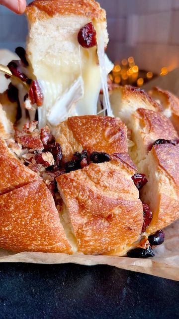 Tieghan Gerard on Instagram: "Cranberry Brie Pull Apart Bread. Never enough Brie over the holidays. Never this is one of my oldest recipes, but yet we still make it every single year. It’s just so extra yummy. And easy, so you know we love that. 1 round loaf sourdough bread 4 tablespoons butter 2/3 cup raw pecans chopped 3 tablespoons brown sugar 1 (16 ounce) wheel of brie, cubed 1 cup dried cranberries https://www.halfbakedharvest.com/cranberry-brie-pull-apart-bread/" Cranberry Brie Pull Apart Bread, Brie Pull Apart Bread, Loaf Sourdough Bread, Oldest Recipes, Tieghan Gerard, Cranberry Brie, Xmas 2022, Christmas Dinner Party, Pull Apart Bread