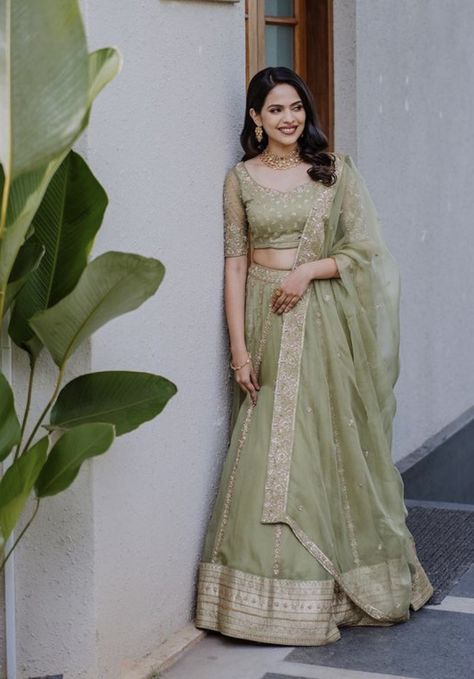 WhatsApp on 9496803123 to customise your handcrafted designer bridal wear with us online. Book your appointment today. We do ship internationally. (Pics for reference) Pastel Green Lehenga Bridal, Pastel Green Lehenga Combinations, Green Lehenga Outfit, Saree Gowns Dresses Indian, Pastel Green Lehenga, Light Saree, Mehandi Outfit, Mehandi Outfits, Bridesmaid Lehengas