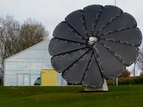 Sunflower Shaped Solar Panel Detail Under Blue Sky Editorial Photo - Image of lawn, fixture: 135302181 Sunflower Solar Panel, Solar Tent, Sun Panels, Dream Building, Quonset Hut Homes, Circle House, Quonset Hut, Sky Photo, Photovoltaic Panels