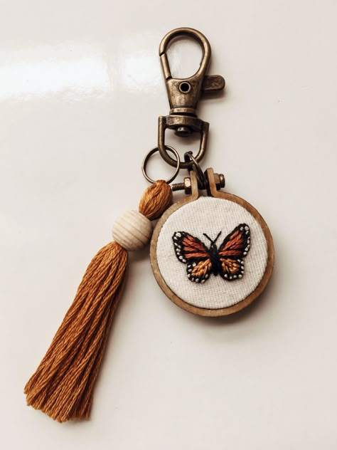 Hand stitched embroidery keychain. Please do not copy this design. Small Cute Embroidery Designs, Small Butterfly Embroidery, Creative Embroidery Inspiration Ideas, Embroidery Gifts For Him, Small Embroidery Patterns, Small Embroidery Ideas, Hand Embroidery Products, Embroidery Thread Crafts, Keychain Embroidery