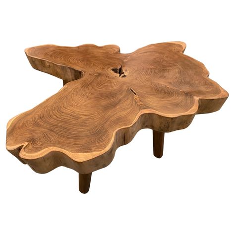 Impressive three inch single slab live edge teak wood coffee table. This beautiful butterfly shape is set on mid century style legs. Finished with a natural oil revealing the beautiful wood grain. We have a collection. The price and images reflect the one shown. Own an Andrianna Shamaris original. Andrianna Shamaris. The Leader In Modern Organic Design. Raw Wood Coffee Table, Teak Wood Coffee Table, Southwest Modern, Log Coffee Table, Modern Cocktail Tables, Modern Organic Design, Midcentury Style, Organic Modern Decor Living Room, Round Wood Coffee Table