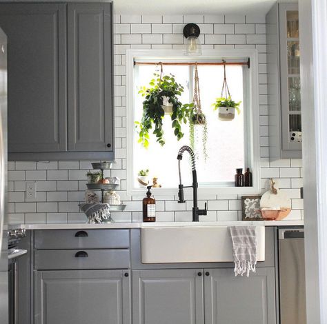 Today I’m sharing 13 real-life beautiful and inspirational IKEA kitchens. If you are joining me from Instagram you know I post my kitchen frequently and it is always one of my most popular posts! We have a white and bright IKEA kitchen – if you would like more details about our kitchen renovation click here. … Kitchen Window Plants, Kitchen Window Decor, Kitchen Sink Window, Kitchen Plants, Kitchen Redo, Ikea Kitchen, Trendy Kitchen, Kitchen Window, Kitchen Colors