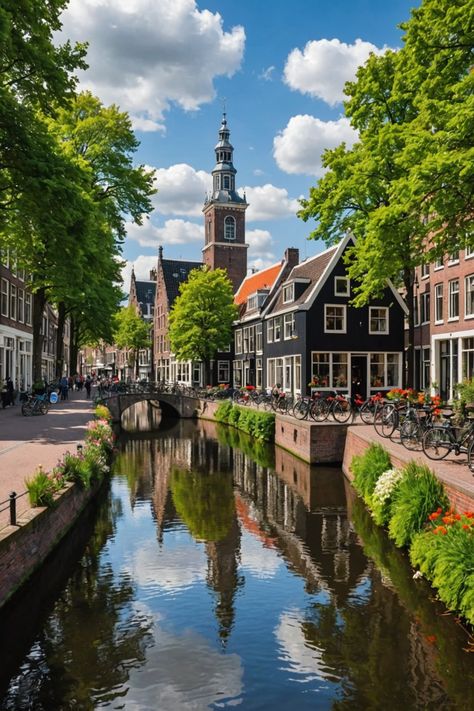 10 Must-Visit Places in the Netherlands for an Unforgettable Trip! Netherlands Beautiful Places, Beautiful European Cities, Canals Of Amsterdam, Tulips In Netherlands, Delft Netherlands Aesthetic, The Netherlands Travel, Netherland Architecture, Amsterdam Countryside, Harlem Netherlands