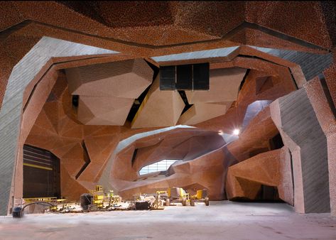 Architect Fernando Menis claims to have developed a new construction technique, demonstrated by this concert hall in Poland featuring faceted surfaces Torun Poland, Cave Interior, Music And Architecture, Music Restaurant, Cinema Interior, Mayan Architecture, House Concert, Playgrounds Architecture, Toronto Architecture