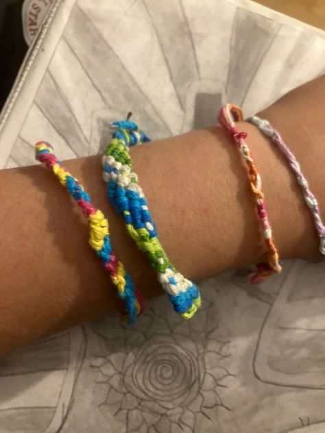 In order from left to right: pansexual candy stripe, gay candy stripe, lesbian spiral, mermaid spiral Candy Stripe Bracelet, Candy Stripes, Friendship Bracelet, Friendship Bracelets, Mermaid, Candy, Bracelet, Quick Saves