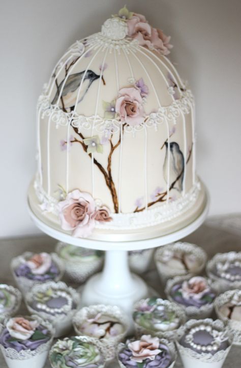 The matching birdcage cake for Joanna. Loved painting this one. PS: Sorry about the photo quality this was taken before delivery #thesugaredroserealweddings #thesugaredrose #birdcagecake #paintedbirdcagecake Birdcage Cake, Vintage Winter Wedding, Bird Cage Cake, Pastel Inspiration, Vintage Winter Weddings, Small Cupcakes, Sugar Rose, Wedding Order, Fish Cake