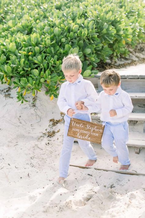 These destination wedding ring bearers in this Bahamas beach wedding wore adorable white and blue ring bearer outfits. These ring bearers looked cute and were traditionally dressed for a beach wedding ceremony in the Bahamas. Save this photo to your wedding inspiration board for ring bearer outfit ideas. Ring Bearer Beach Wedding, Ring Bearer Outfits, Beach Bahamas, Wedding Ring Bearer Outfit, Outfit Ideas Beach, Bahamas Wedding, Bearer Outfit, Beach Wedding Flowers, Ceremony Design