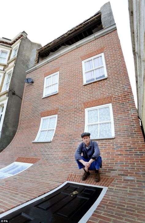 Talk about thinking outside of the box! Artist Alex Chinneck makes a home look like it has slid into the front garden. See more with the Daily Mail. Alex Chinneck, Flood Proof House, Derelict House, Margate Kent, Public Artwork, Architecture Concept Drawings, Illusion Art, Big Art, Facade House