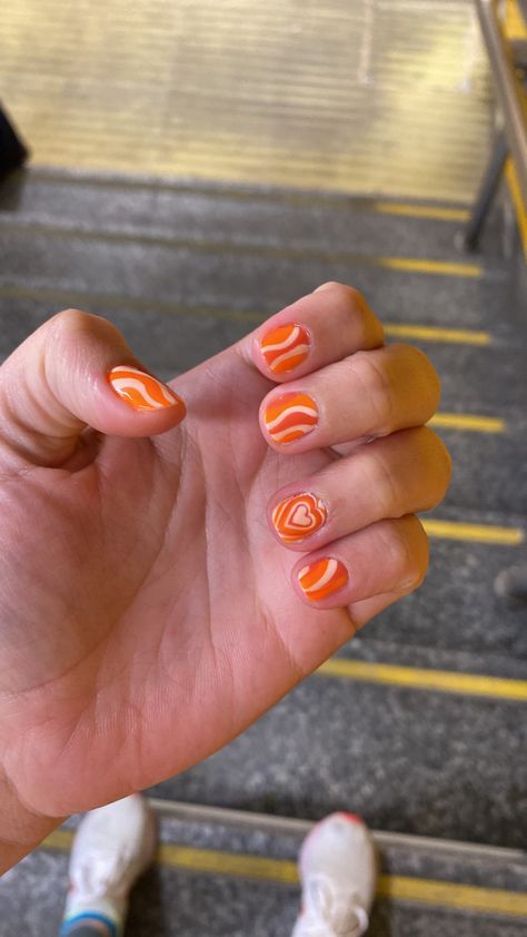 Hippie and groovy orange nails Orange Heart Nails, Short Hippie Nails, 1970s Nails, Retro Nails Vintage, 70’s Nails, 70s Nail Designs, 70s Nails, Nails Orange, Orange Nail Designs