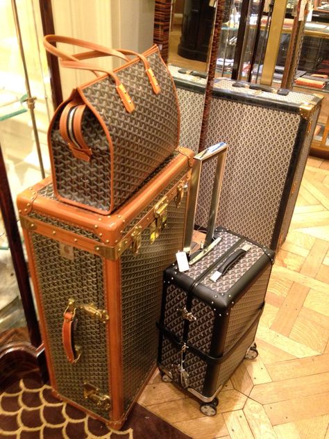 Goyard hardside luggage and purse on display at Bergdorf Goodman NYC. Goyard Luggage, Bergdorf Goodman Nyc, Goyard Trunk, Airport Attire, Travel Equipment, Hardside Luggage, Goyard Bag, Flying High, Fancy Bags