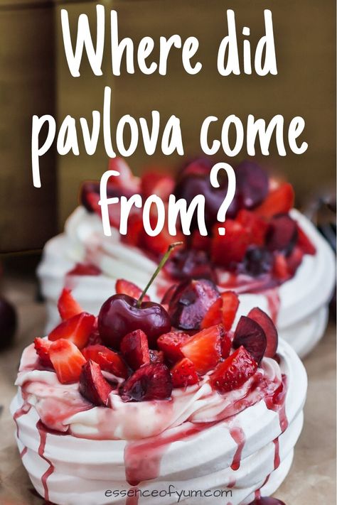 Closeup of a small pavlova topped with strawberries and cherries, and the text where did pavlova come from.. Pavola Desserts, Pavlova Decoration, Christmas Pavlova Recipe, Easy Pavlova Recipe, Pavlova Christmas, Best Pavlova, Classic Pavlova Recipe, Australian Pavlova Recipe, Pavlova Photography