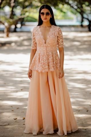 Shop for Nikita Vishakha Peach Organza Peplum Top And Gharara Set for Women Online at Aza Fashions Peplum Top Outfits, Trendy Outfits Indian, Lehenga Designs Simple, Frock For Women, Indian Dresses Traditional, Indian Gowns Dresses, Designer Party Wear Dresses, Designer Dresses Casual, Party Wear Indian Dresses