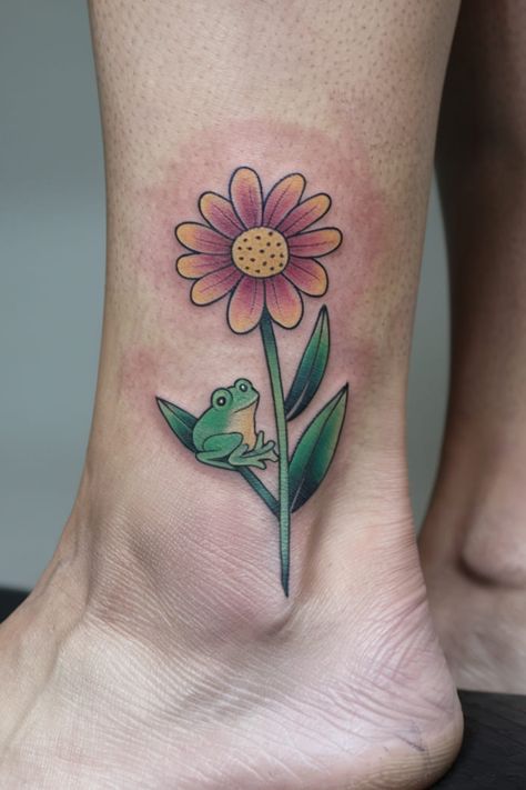 Wildflower with a Tiny Frog on the Ankle Wildflower Tattoos, Tattoo Making, Wildflower Crown, Comic Book Tattoo, Dolphins Tattoo, Wildflower Tattoo, Cartoon Character Tattoos, Medusa Tattoo, Home Tattoo