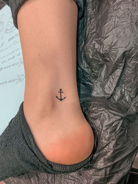 50 Best Small Travel Tattoos Ideas That Will Inspire Inner Wanderers Nautical Small Tattoos, Minimal Anchor Tattoo, Anchor Tattoo Ideas For Women, Small Anchor Tattoos For Women Simple, Anchor Tatoos Woman, Mini Anchor Tattoo, Us Navy Tattoos For Women, Tattoo Anchor Women, Dainty Anchor Tattoo