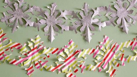 How to Make Paper Snowflake Chains.  Once I got the idea I also made gingerbread men and ornaments. Paper Christmas Crafts, Paper Doll Chain, How To Make Snowflakes, Victorian England, Paper Angel, Wrapping Paper Crafts, Paper Chain, Paper Snowflake, Holiday Templates