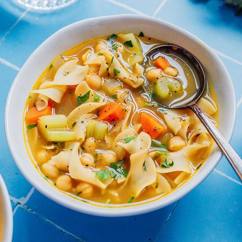 Craving something comforting but don’t want to spend hours in the kitchen? Say hello to your new go-to meal—vegetarian chickpea noodle soup! This quick and easy recipe (seriously, 30 minutes and one pot) is packed with all the coziness of classic chicken noodle soup, using good-for-you ingredients! Easy Vegetarian Soup Recipes, Vegetarian Chicken Noodle Soup, Easy Vegetarian Soup, Chickpea Noodle Soup, Chickpea Noodle, Meal Vegetarian, Classic Chicken Noodle Soup, Vegetable Soups, Vegetarian Soup Recipes