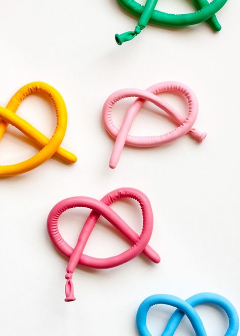 DIY Pretzel Stress Balls | Handmade Charlotte Fidgets Diy, Diy Stressball, Diy Sensory Toys, Fidget Tools, Pretzel Shape, Diy Fidget Toys, Handmade Charlotte, Balloon Pump, Camping Crafts