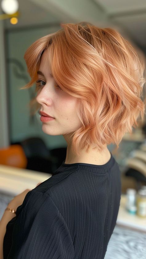 25 Trendy Color Ideas for Short Hair to Enhance Your Style Peach Toned Hair, Peach Pixie Hair, Strawberry Blonde Bob With Bangs, Short Peach Hair, Peach Short Hair, Apricot Hair Color, Strawberry Blonde Short Hair, Hair Color Pixie Cut, Peach Hair Color