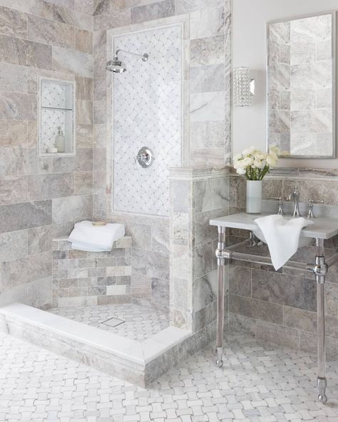 There are a few key elements you can add to any design to ensure it feels elevated, custom, and complete. Today on our story, we're walking you through the best ways to layer trim pieces. Head to the blog for more! Tile Threshold, Grey Travertine, Shower Threshold, Travertine Bathroom, Shower Curb, Travertine Wall Tiles, White Marble Tiles, Vanity Bathroom, Bathroom Shower Tile