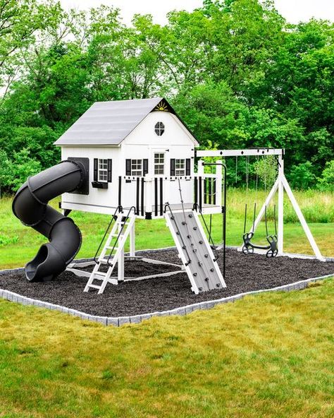 King Swings - Swing Sets & Playgrounds on Instagram: "If you want your swing set to be the talk of the neighborhood then you need your own Palace Playhouse! Our customers love bright and bold swing sets but they love having minimalistic color options that match and compliment their homes. From Turbo Tube Slides to rock climbing walls this play set will keep your kids entertained all day! DM us to bring the playground home!" White Playground Set, Play Grounds For Kids, At Home Playground Outdoor, Minimalist Playground, Home Playground Ideas, Playset Ideas, Deck Redo, Quarry House, Rock Climbing Walls