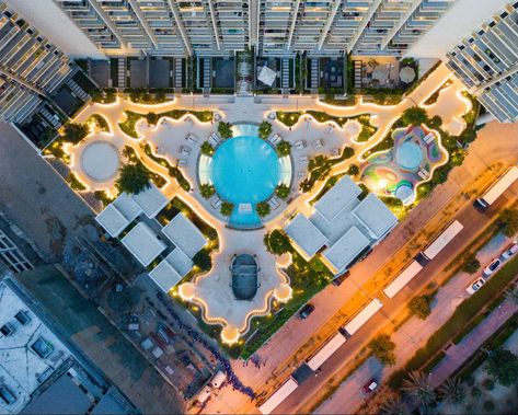 Contemporary Podium Landscape Architecture Design for Zaya Hameni Redesidential Tower, Dubai. Designed by Kamelia Landscape Design. Centered around a circular pool. The lighting design brings the landscape to life #kamelialandscapedesign #landscape #contemporarylandscaping #design #pool #poolideas #landscapearchitecture #lightingideas #design #podium #landscapedesign Building Podium Design, Podium Landscape Design, Podium Design Architecture, Circular Pool, Architecture Apartment, Biophilic Architecture, Residential Architecture Apartment, Podium Design, Landscape Concept