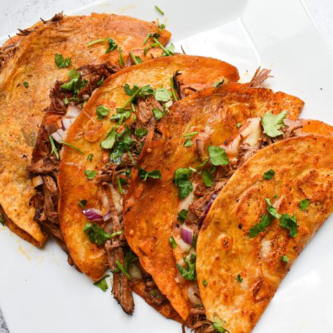 Birra Tacos (Quesabirria Tacos) Birra Taco, Lamb Birria, Birra Tacos, Quesabirria Tacos, Spicy Stew, Oaxaca Cheese, Birria Tacos, Garlic Seeds, Garlic Uses