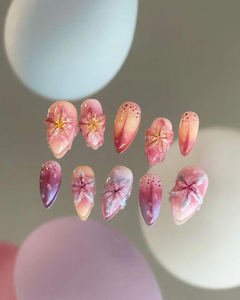 Lilies field 𓍢ִ໋🌸ᰔᩚ 🔷 custom press-ons, medium length, almond-stiletto shaped 🔷Time to step into summer elegance with my custom press-ons: Lilies Field!💖 These medium-length almond-stiletto nails are inspired by the delicate beauty of lilies, perfect for adding a touch of floral charm to your style. Embrace the art of nature at your fingertips. • • • #nailartist #lilies #flowernails #paris16 #nails #gelnails #almondnails #pressonnails #nailart #naildesign #nailspiration #gel #gelxnails #3dflo... Lilies Nails, Almond Stiletto, Lily Nails, Tiny Office, Art Of Nature, Nail Store, Summer Elegance, Pretty Gel Nails, Press Ons