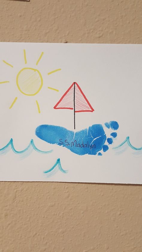 Footprint sailboat Footprint Boat Craft, Summertime Art For Toddlers, Sailboat Footprint Craft, Boat Handprint Art, Beach Infant Crafts, June Art For Toddlers, Infant Room Classroom Ideas, Beach Footprint Art, Ocean Art For Infants