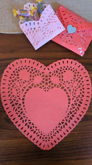 Valentine Heart Envelope, Paper Heart Doily Envelope, Valentines With Paper Doilies, Heart Dollie Envelope, How To Fold A Heart Into An Envelope, Paper Heart Doilies Crafts, Paper Doily Crafts Valentine Heart Cards, Valentine Crafts With Heart Dollies, Valentine Doilies Craft