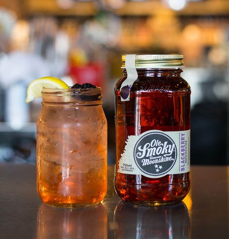 4 Moonshine Cocktails to Celebrate National Moonshine Day Moonshine Cocktails Recipes, Ole Smoky Moonshine Recipes Drinks, Old Smokey Moonshine Recipes, Ole Smokey Moonshine Recipes Cocktails, Moonshine Drinks, Blueberry Moonshine, Moonshine Drink Recipes, Ole Smokey Moonshine, Old Smokey Moonshine