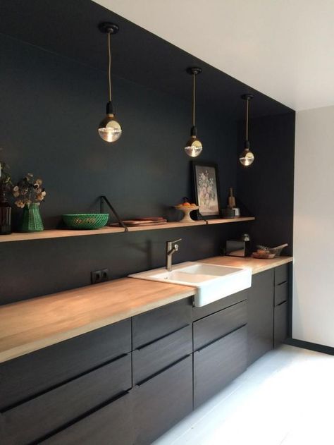 Black cabinets with butcher block counter tops. Dapur Skandinavia, Dapur Ikea, Best Kitchen Lighting, Model Dapur, Ikea Kitchen Design, Kabinet Dapur, Kitchen Chandelier, Modern Kitchen Interiors, New Kitchen Cabinets