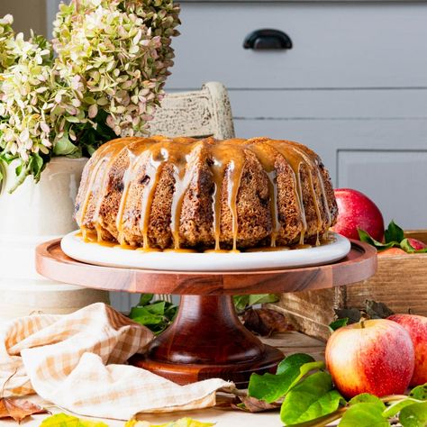 This moist apple Bundt cake is an old-fashioned, easy dessert. Also known as "Apple Dapple Cake," the warmly-spiced batter is studded with bits of fresh apples and chopped nuts, and finished with a buttery caramel sauce. Apple Dapple Cake, Salted Caramel Glaze, Apple Dapple, Moist Apple Cake, Cake Apple, Apple Bundt Cake, Fresh Apple Cake, Cake With Caramel, The Seasoned Mom