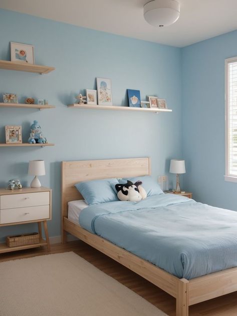 Create a light blue aesthetic bedroom by incorporating anime-inspired elements. Add a playful and eye-catching anime wall mural, complemented by a minimalist wooden bed frame and shelves adorned with anime figurines or artwork. Bedroom Ideas For Small Rooms Blue Wall, Bedroom Blue Walls Aesthetic, Medium Blue Bedroom, Blue Bedroom Paint Colors, Anime Wall Mural, Light Blue Wall Paint, Minimalist Wooden Bed, Light Blue Room Aesthetic, Blue Aesthetic Bedroom