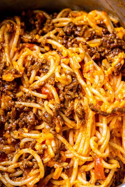 Taco Spaghetti gives a family favorite a fun taco night twist! Spaghetti in cheesy beefy taco meat sauce made with taco seasoning and salsa. Saucy Taco Meat Recipes, Spaghetti With A Twist, Spaghetti Tacos Recipe, Crockpot Taco Spaghetti, Taco Speggetti Recipes, What To Do With Leftover Taco Meat, What To Make With Taco Meat, Recipes Using Taco Meat, Taco Spaghetti To Die For