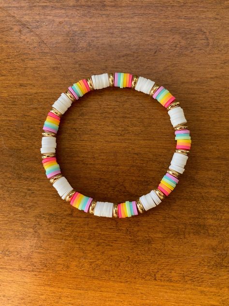 bracelet size is about 6.75 inches :) Preppy Make Bracelet Aesthet, Preppy Heishi Bead Bracelet, Preppy Heshi Bead Bracelets, Clay Bead Necklace Combos, Clay Bead Shell Bracelet, Rainbow Heishi Bracelet, Best Friend Bracelets Clay Beads, Clay Was Bracelet Ideas, Bracelet Ideas For Small Business