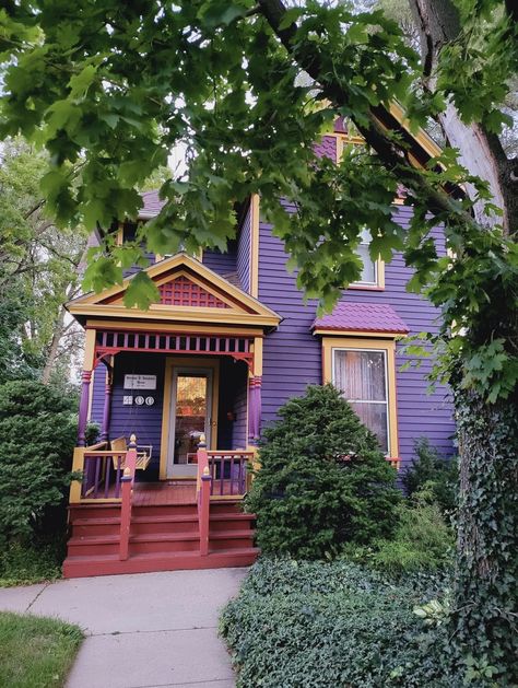 Green And Purple House Exterior, Purple Bungalow Exterior, Yellow House Purple Shutters, Yellow And Purple House Exterior, Victorian Homes Purple, Purple Houses, Exterior Paint Schemes, Painted Houses, Purple House