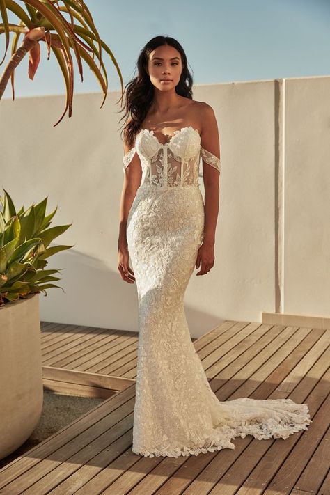 A sexy sparkly courure bridal gown. This gown comes with a detachablke overskirt, so you can have 2 extravagent looks in one. Click on the link to view more photos of this beautiful gown, part of our Santorini Dreaming collection. Off The Shoulder Sheath Wedding Dress, Zavana Couture, Corset Bodice Wedding Dress, Mermaid Wedding Dress With Train, Corset Mermaid Wedding Dress, Ivory Bridal Gown, Bodice Wedding Dress, Couture Bridal Gowns, Open Back Wedding Dress