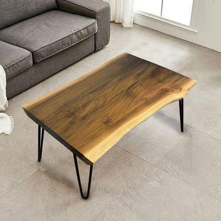 Crafted from sturdy Teak wood, this rectangle coffee table boasts an artistic design that complements any decor style. With easy assembly and a wipe clean surface, it is not only well-made but also functional. Elevate your living space with this elegant and timeless statement piece. Size: 27.6" x 19.6" x 20.9".  Color: Off-White. Live Edge Coffee Table Farmhouse, Redwood Coffee Table, Raw Edge Wood Coffee Table, Live Edge End Table, Live Edge Coffee Table Wooden Legs, Black Walnut Coffee Table Live Edge, Teak Wood Coffee Table, Live Wood Coffee Table Rectangle, Coffee Table Natural