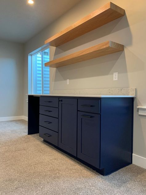 Blue basement kitchenette with wood shelving by Hope Custom Building in Lehi, Utah. Loft Kitchenette Ideas, Ikea Kitchenette Basement, Open Shelving Kitchenette, Basement Serving Counter, Small Kitchenette Basement, Galley Bar Basement, Basement Bar No Sink, Diy Basement Kitchenette, Basement Cabinet Ideas Storage