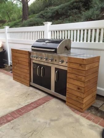 diy grill tables make a standard grill look built in like a custom outdoor kitchen Diy Grill Surround Easy, Outdoor Kitchen Freestanding Grill, Traeger Timberline Xl Built In, Mini Outdoor Kitchen, Diy Grill Table, Grill Diy, Side Planks, Table Grill, Dresser Plans