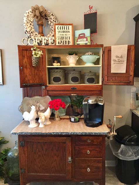 A farmhouse decorated Hoosier Cabinet #blessyourheart #hoosiercabinet #homedecor #homedecorating Hoosier Cabinet Makeover Coffee Bar, Hoosier Coffee Bar, Decorating Hoosier Cabinet, Hoosier Cabinet Decor, Antique Coffee Bar Ideas, Hoosier Cabinet Coffee Bar Ideas, Hoosier Cabinet Ideas, Hoosier Cabinet Ideas Farmhouse, Hoosier Cabinet Decorating Ideas