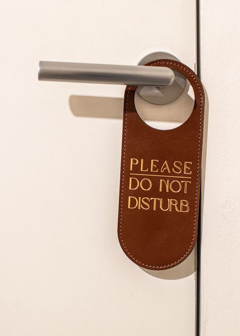 Refine your guests' privacy with our Do Not Disturb Door Sign. This custom door sign, perfect for hotels, features a stylish, minimalist design that complements any interior. The hotel room sign is made from two layers of thick Italian leather and is available in various colors to suit your aesthetic needs. Do Not Disturb Sign Aesthetic, Do Not Disturb Aesthetic, Hotel Door Hanger, Do Not Disturb Door Sign, Hotel Room Key, Recruitment Ads, Do Not Disturb Sign, Room Signage, Don't Disturb Sign