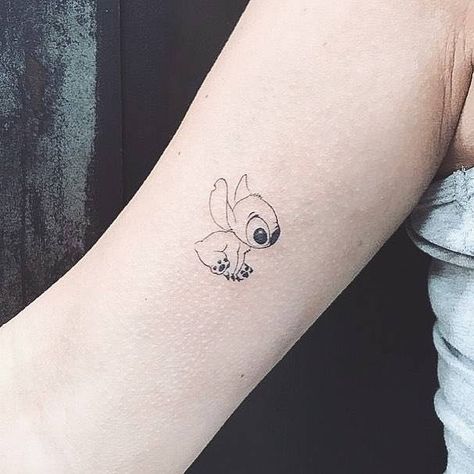 Disney Tattoos That Minimalist Fans ... Disney Tattoos Small Stitch, Stitch Mini Tattoo, Small Tattoos Stitch, Disney Lilo And Stitch Tattoo, Small Tattoo Disney, Small Lilo And Stitch Tattoo, Mini Stitch Tattoo, Stitch Small Tattoo, Stitch Disney Tattoo Ideas