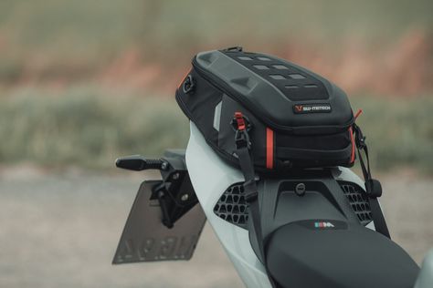 SW Motech PRO Roadpack Tail Bag by Motorrad SG - Quality and Sturdy 1680D Ballistic Nylon and Universal fitment - Stylish Black/Anthracite colorway - 8-14 L Capacity - Strap secured tail bag Order yours at https://motorradsg.com/products/bc-hta-00-307-30000 Leather Bags Handmade, Backpack Travel Bag, Golf Bags, Travel Bag, Singapore, Leather Bag, Backpacks, Leather, Black