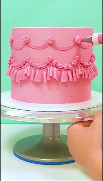 We love seeing old cake trends become new. Join us as we show you how to pipe this beautiful pink vintage-style cake using multiple icing tips.  Audio: Audio... Piping Tips For Vintage Cake, How To Pipe Vintage Cake, Vintage Cake Icing, Retro Piped Cake, Purple And Pink Vintage Cake, Icing Tips, Cake Trends, Pink Decor, Cake Decorating Tutorials