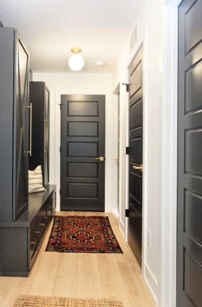 31 Black Interior Doors With White Trim Ideas - | Sebring Design Build Dark Painted Interior Doors And Trim, Black Interior Doors Black Hardware, Black Interior Doors With White Trim Light Wood Floors, Matte Black Trim Interior, Dark Door With White Trim, Interior Black Doors With Black Trim, House With Black Interior Doors, Black Interior Doors White Trim, Black Doors With Black Trim