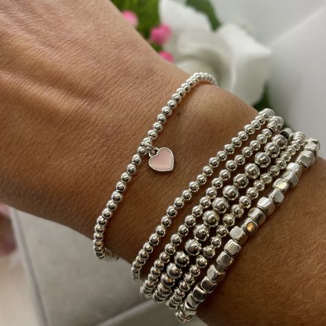 Beaded Bracelets Silver, Silver Beads Bracelet, Pink And Silver Jewelry, Prom Scrapbook, Pink Heart Bracelet, Silver Beaded Bracelets, Silver Bracelet Stack, Bracelet Layering, Silver Beaded Bracelet